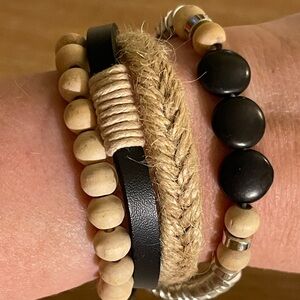 NWT Drifter Away black center stone, cord , 4 layered bracelet
